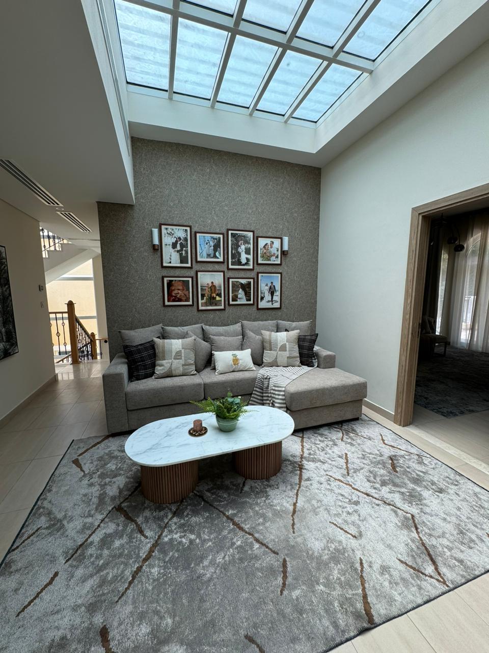 Image file: /images/emirates-hills-1.jpg Double height living room sheer drapery
